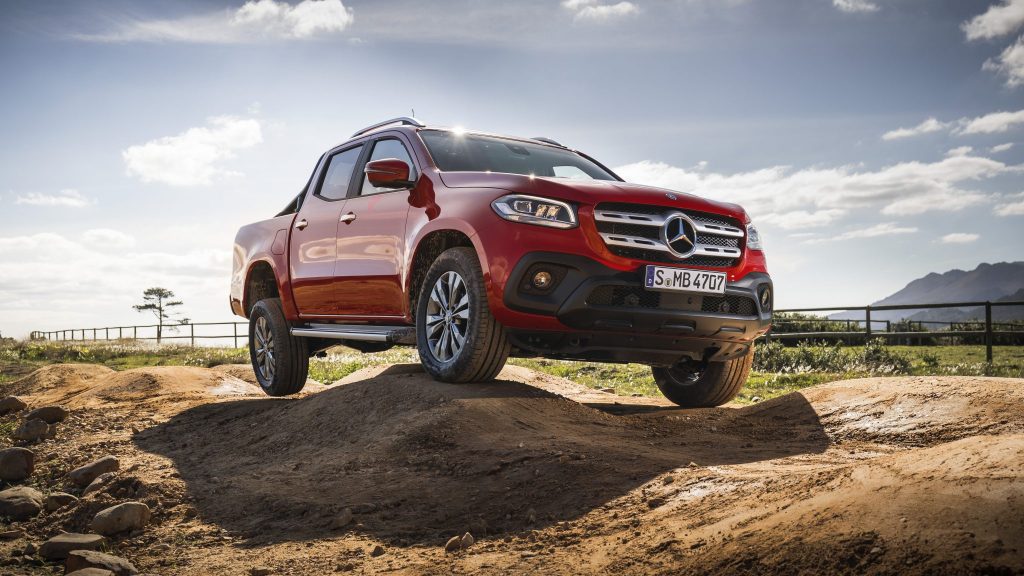 The Mercedes Benz X-Class, in Progressive trim (and a striking red colour) showing the rear end droop over some wombat holes.