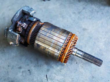 Here you’ll see the commutator and brushes assembly, looking more corroded than they should.