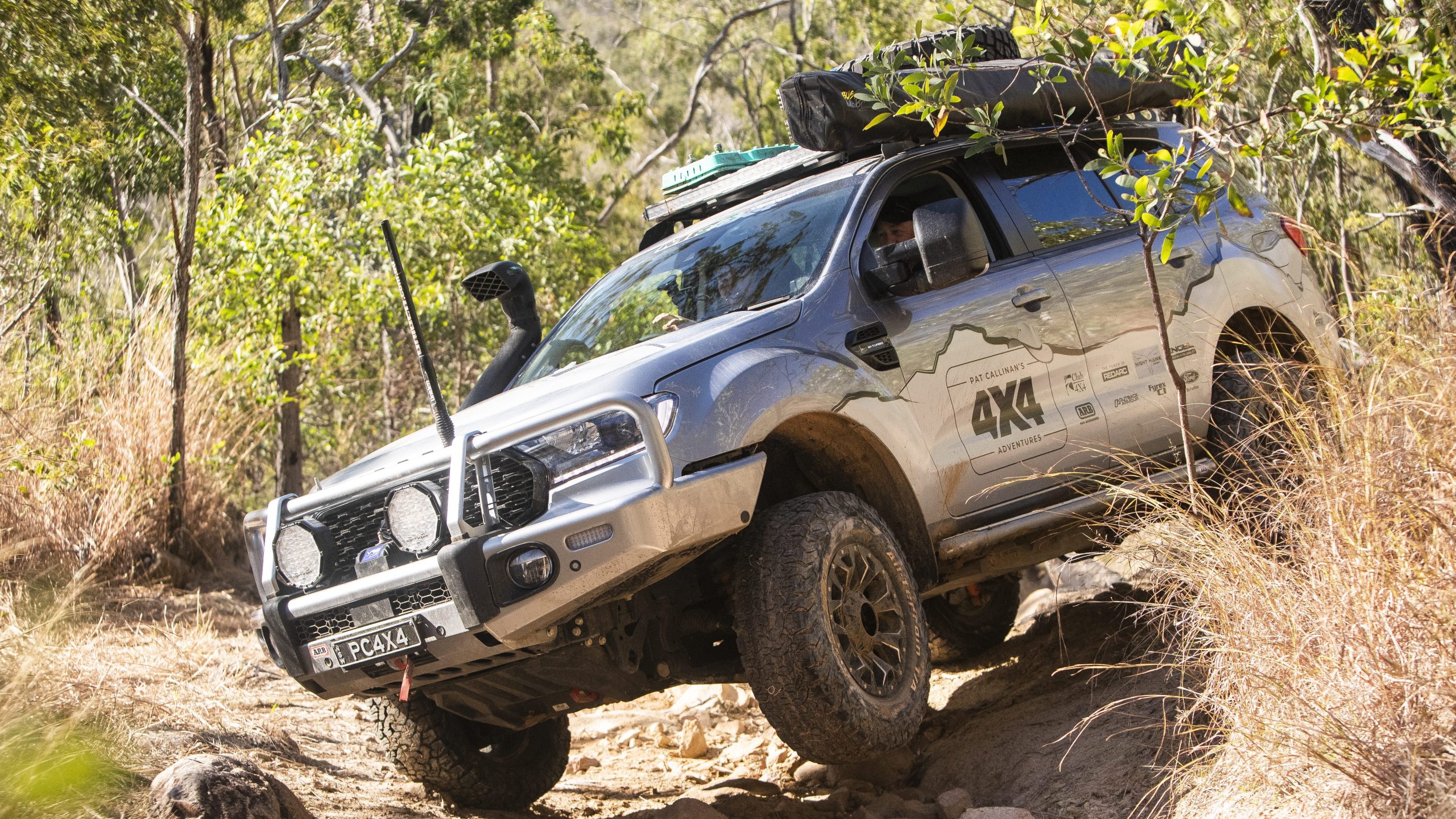 Ford Everest driving down an embankment
