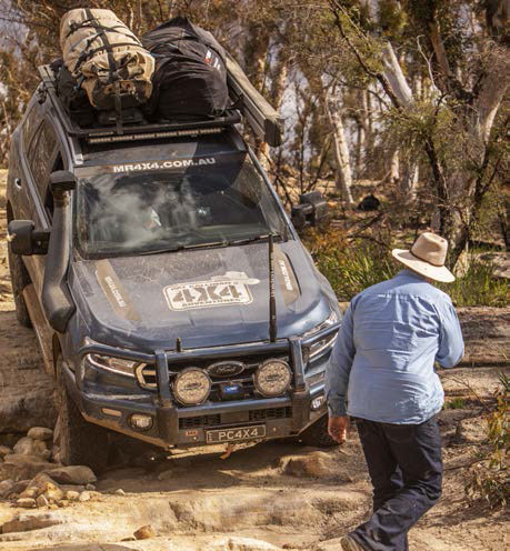 Crawling down a rocky track with Pat guiding