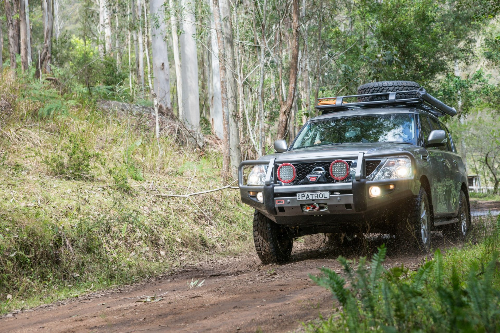 The Nissan Y62 Patrol is a big, burly 4X4 with good on-road dynamics, but is seriously hurt by it's lack of a diesel engine.